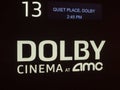 Dolby Cinema at AMC certification logo outside of a movie theater entrance